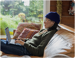 Lady sitting on a couch